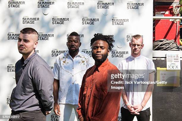 Scottish Hip-Hop and Pop band Young Fathers poase backstage at Central Park SummerStage, New York, New York, July 25, 2015. Pictured are, from left,...