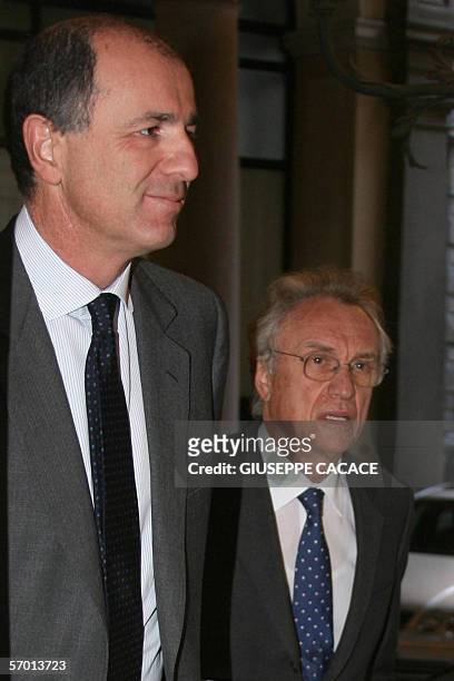 Banca Intesa CEO Corrado Passera and Banca Intesa President Giovanni Bazoli arrive for a press conference to present the full year 2005 report of...
