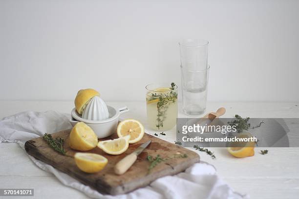 making lemonade drink - lemon juice stock pictures, royalty-free photos & images