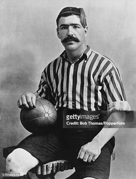 Portrait of Welsh international football player Caesar Jenkyns posed wearing Woolwich Arsenal kit, circa 1895.