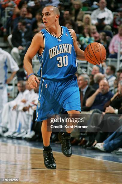 Carlos Arroyo of the Orlando Magic dribbles the ball against the Utah Jazz March 6, 2006 at the Delta Center in Salt Lake City, Utah. NOTE TO USER:...