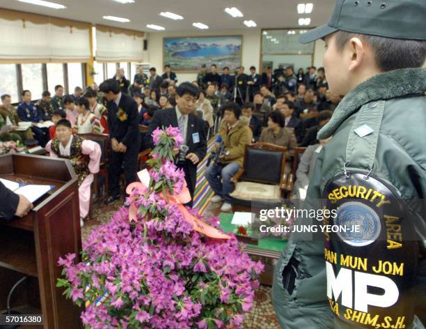 South Korean soldier stands guard during a graduation ceremony at Taesungdong freedom village elementary school in Paju, 15 February 2006. Paju is...