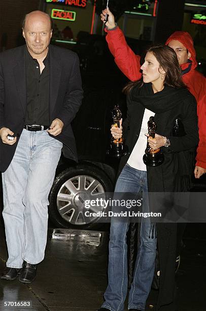 Writer/producer/director Paul Haggis arrives with "Crash" associate producer Dana Maksimovich at Crown Royal and Tab Energy Drink's Cool Down Post...