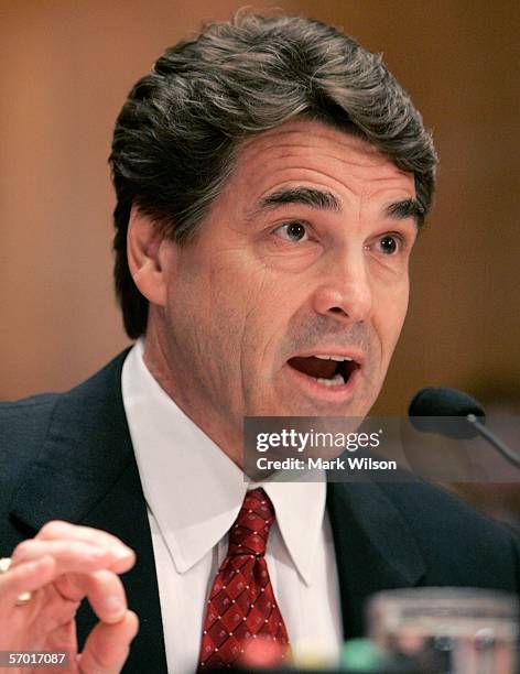 Texas Governor Rick Perry gestures as he speaks during a Senate Appropriations Committee hearing on Capitol Hill March 7, 2006 in Washington, DC. The...