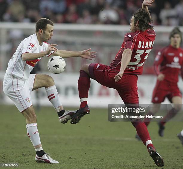 Stefan Blank of Kaiserslautern competes with Dnijel Ljuboja of Stuttgart during the Bundesliga match between 1.FC Kaiserslautern and VFB Stuttgart at...