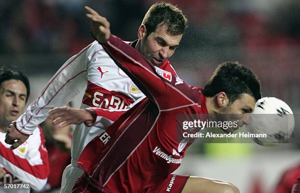 Matthieu Breda of Kaiserslautern competes with Markus Babbel of Stuttgart during the Bundesliga match between 1.FC Kaiserslautern and VFB Stuttgart...