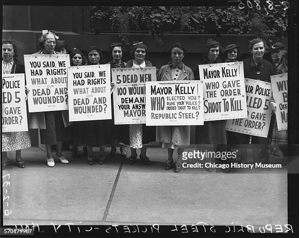Women protesters picketing at City Hall in support of Republic Steel strikers after what is known as the Memorial Day massacre, Chicago, Illinois,...