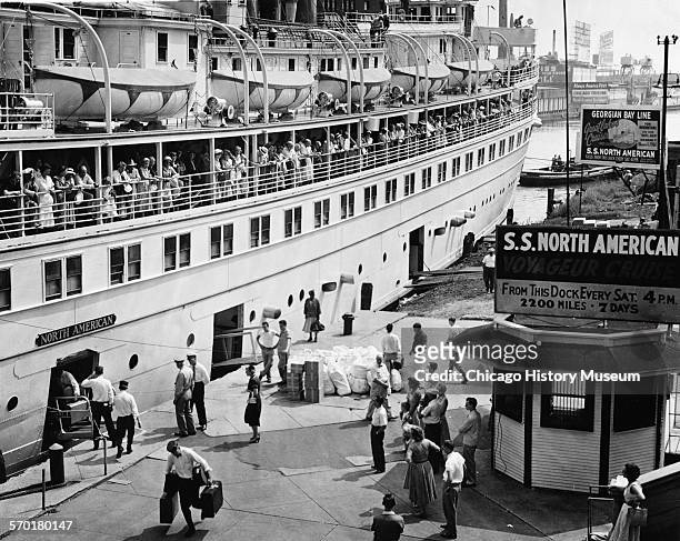 View of the SS North American steamboat docked at the southeast corner of the Michigan Avenue Bridge, Chicago, Illinois, July 31, 1954....