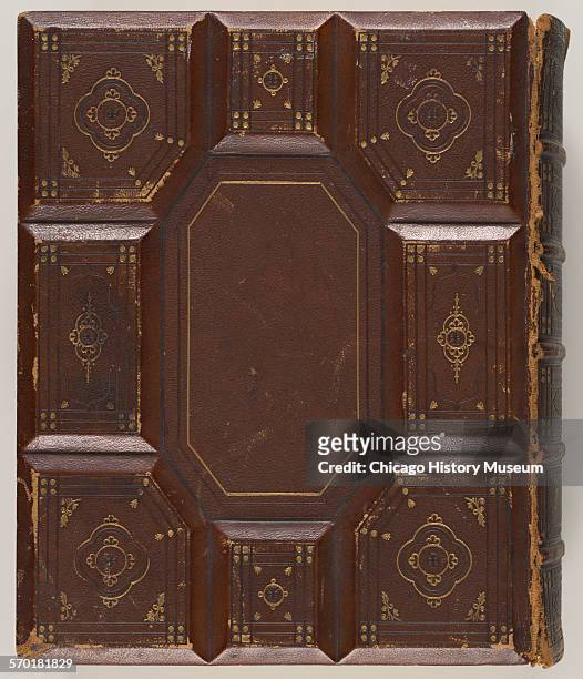 Embossed leather bound bible with gold-leaf designs owned by Nina Spies , widow of August Spies, who was executed in association with the trial...