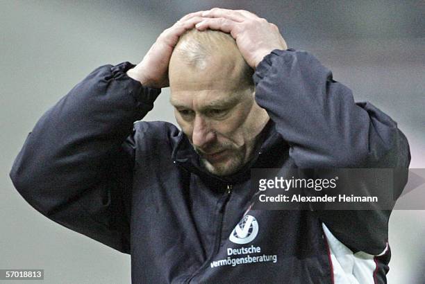 Headcoach Wolfgang Wolf of Kaiserslautern looks dejected after Stuttgart scored the 1:1 equalizer during the Bundesliga match between 1.FC...