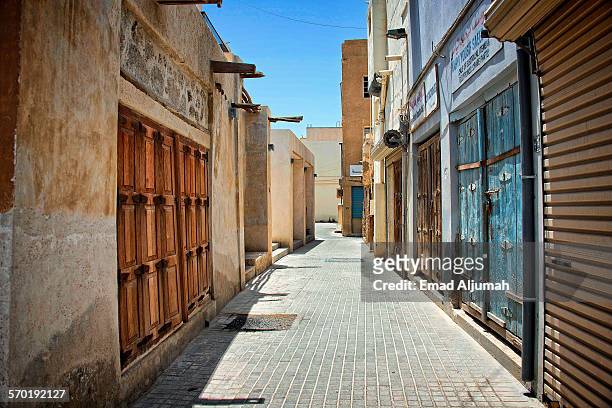 traditional buildings of muharraq, bahrain - bahrein stock pictures, royalty-free photos & images