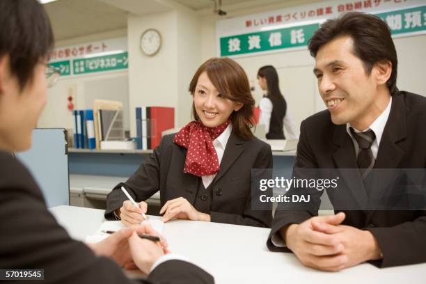 Bank Uniforms Photos and Premium High Res Pictures - Getty Images