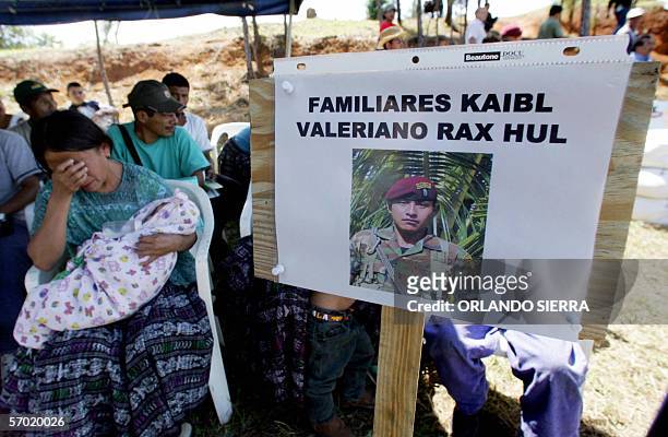 Rosa Caal llora junto a una foto de su esposo Valeriano Rax Hul, uno de los ocho kaibiles cascos azules guatemaltecos muertos en una mision de paz en...
