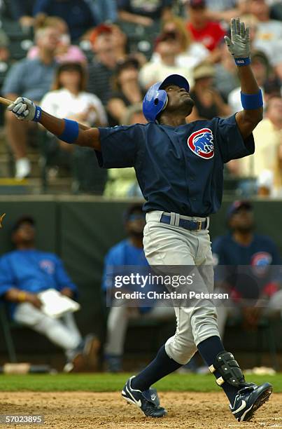 Outfielder Felix Pie of the Chicago Cubs bats against the Oakland Athletics during the MLB Spring Training game at Phoenix Municipal Stadium in...