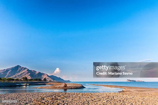 scenic view of mountain and island - zambales province stock pictures, royalty-free photos & images
