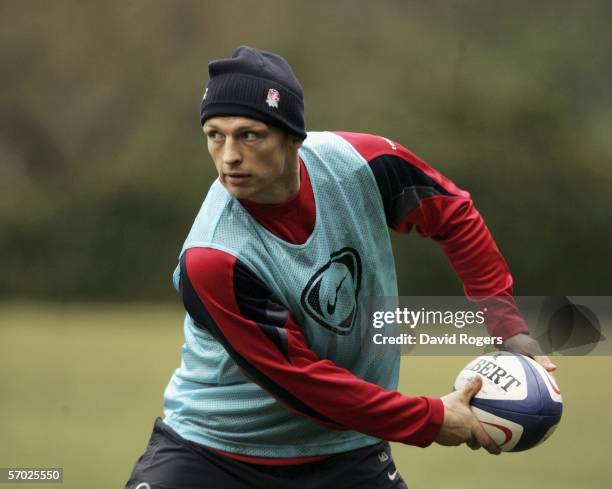 Matt Dawson, the England scrumhalf passes the ball during the England rugby union training held at the Pennyhill Park Hotel on March 8, 2006 in...