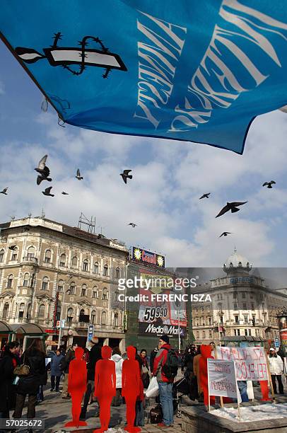 An Amnesty International flag floats in the air 08 March 2006 as associations, "NANE", women's rights assoation, "Habeas Corpus" Working Groups,...