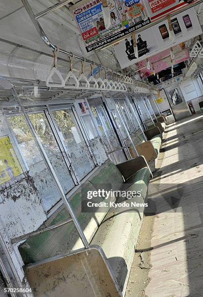 Japan - Photo taken March 18 shows the inside of a train on the JR Senseki Line, which was derailed and tilted by the March 11 massive...