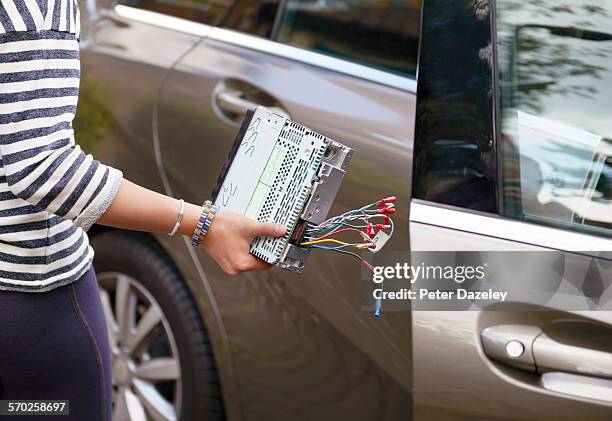 teenage car crime - auto radio stock pictures, royalty-free photos & images