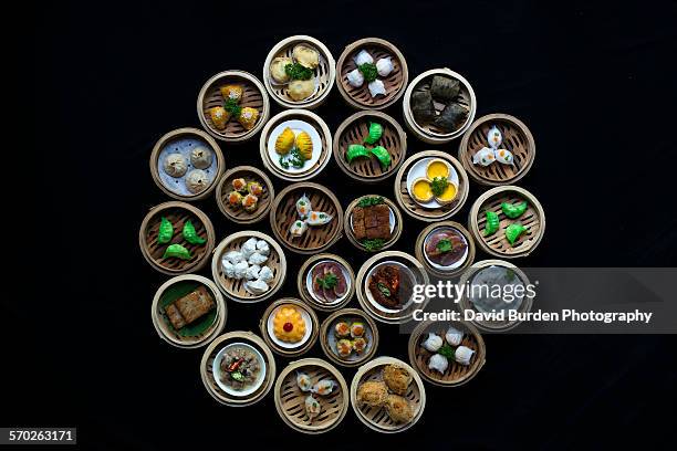 mix of dimsum dishes in a circle - dim sum stock-fotos und bilder