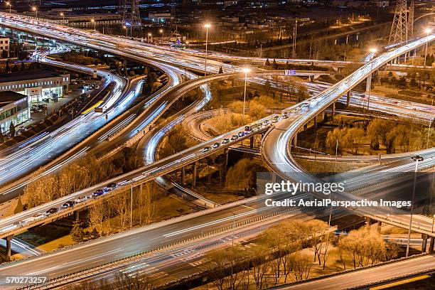 a complex multi-stack interchange in beijing - stack_interchange stock pictures, royalty-free photos & images