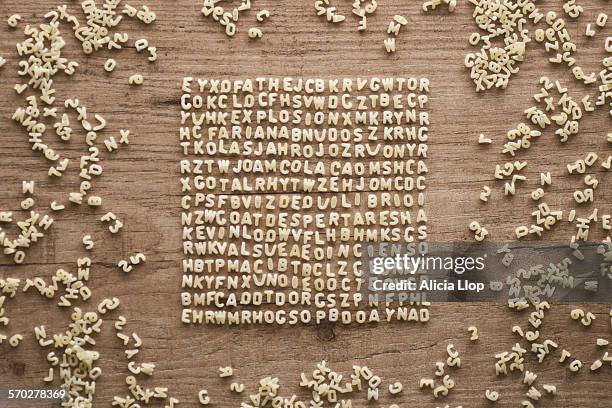 alphabet soup - schrift stock-fotos und bilder