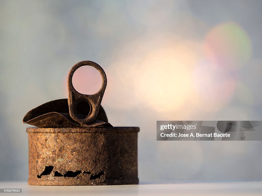 Rusty tin can and old