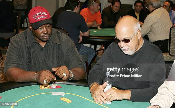 Former NFL player and Heisman Trophy winner George Rogers and Rene Angelil, Celine Dion's husband and manager, participate in the Jeff Gordon...