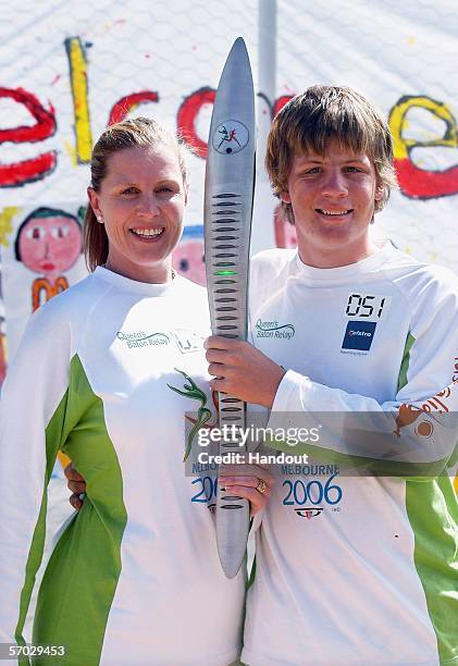 Tracy Williams and her son Sean Dwyer pose with the Melbourne 2006 Queen's Baton during its journey from Horsham to Ararat as part of the Melbourne...