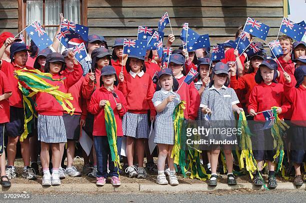 School children wait for the Melbourne 2006 Queen's Baton during its journey from Horsham to Ararat as part of the Melbourne 2006 Commonwealth Games...
