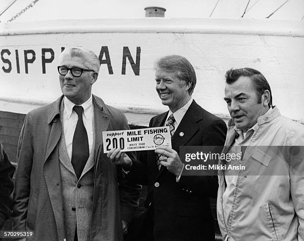 American politician and Presidential candidate Jimmy Carter speaks with fishermen about fishing rights in New Bedford, Massachusetts, 1976.