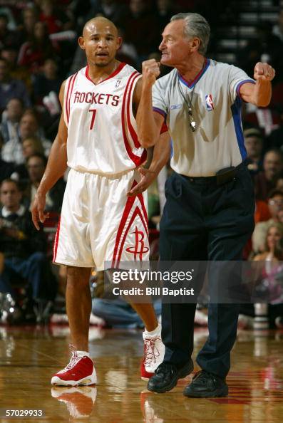 David Wesley of the Houston Rockets watches Official Jack Nies make a ...