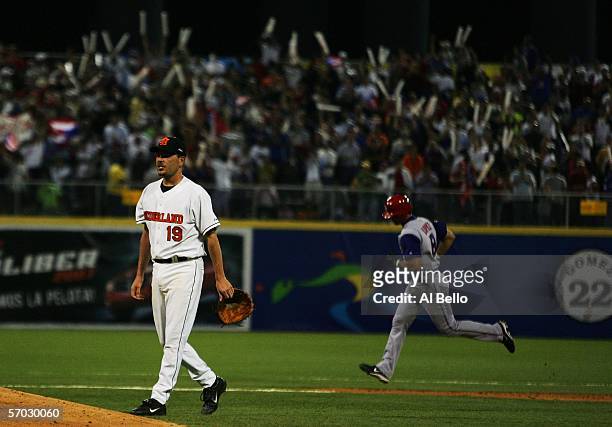 Javy Lopez of Puerto Rico rounds the bases after hitting a home run off of Dirk Van 't Klooster of The Netherlands during their game at the World...