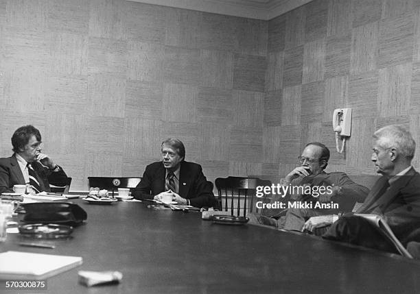 American politician and Presidential candidate Jimmy Carter meets with the editorial board of the Boston Globe in Boston, Massachusetts, 1976.