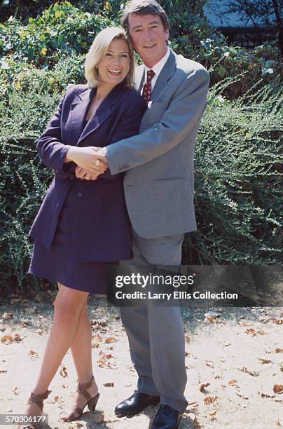 English television presenter, Penny Smith, and Northern Irish journalist and broadcaster, Gordon Burns, circa 1995.