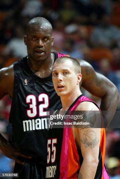 Jason Williams and Shaquille O'Neal of the Miami Heat take a breather while playing against the Washington Wizards on March 8, 2006 at American...