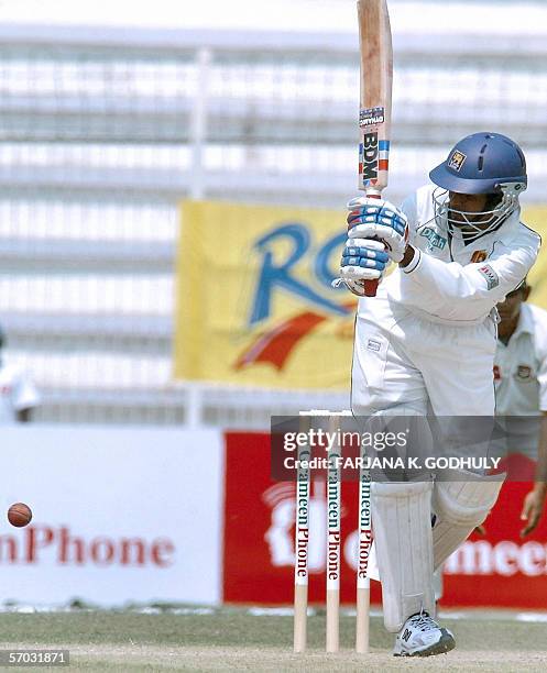 Sri Lankan cricketer Upul Tharanga hits a ball during the second day of the second Test Match between Bangladesh and Sri Lanka at the Shahid Chadu...