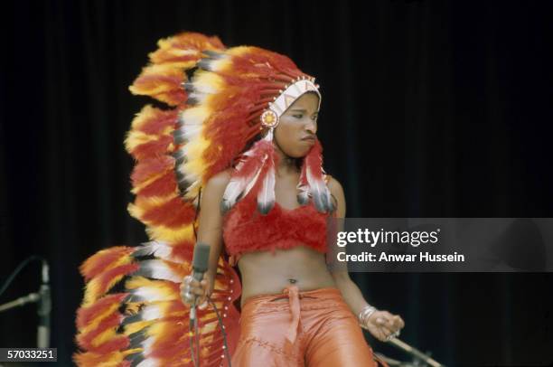 Chaka Khan, lead singer of American funk group Rufus, performing in a native American costume, circa 1975.