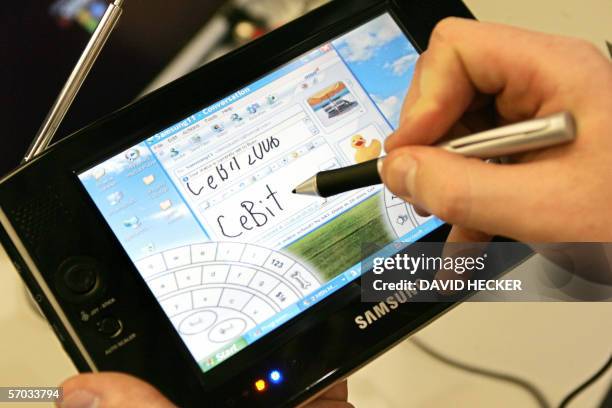One Computer Mobile Images 70 Ultra Mobile Pc Stock Photos, High-Res Pictures, and Images - Getty ...