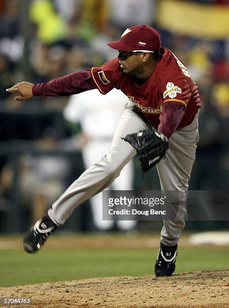 Closing pitcher Francisco Rodriguez of Venezuela finishes his last pitch, a strikeout to end the game against Australia in a first round pool D World...