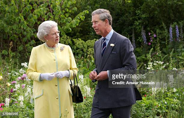 Queen Elizabeth II and Prince Charles the Prince of Wales look at the 'Healing Garden', which was designed by the Prince in conjunction with designer...