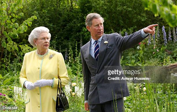 Queen Elizabeth II and Prince Charles the Prince of Wales look at the 'Healing Garden', which was designed by the Prince in conjunction with designer...