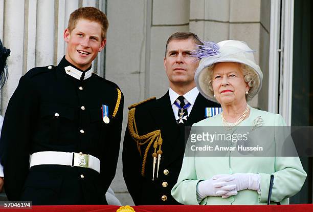 Prince Harry wearing his Sandhurst army uniform, Prince Andrew the Duke of York and HM Queen Elizabeth ll watch the flypast over The Mall of British...