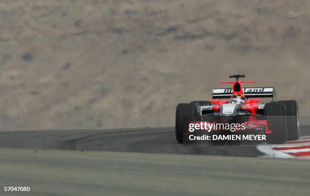 Dutch Midland driver Christian Albers steers his car during the second practice session of the Bahrain Formula One Grand Prix at the Sakhir...