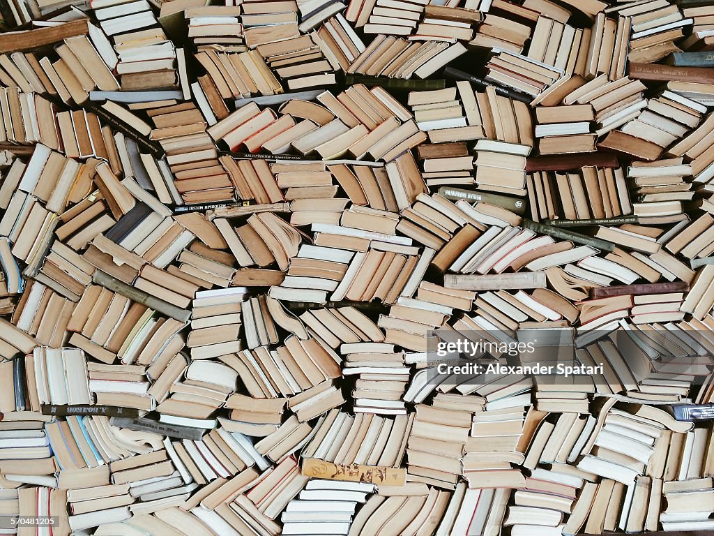 Hundreds of books in chaotic order