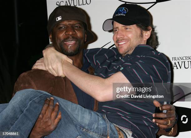 Actors Terry Crews and Jamie Kennedy pose at the grand opening of Equinox Fitness Club on March 9, 2006 in Westwood, California.