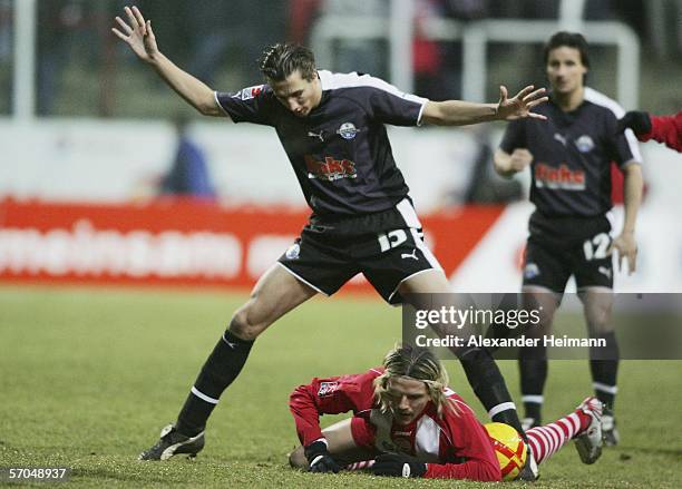 Regis Dorn of Offenbach clashes with Roel Brouwers of Paderborn during the Second Bundesliga match between Kickers Offenbach and SC Paderborn at the...