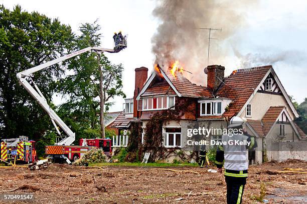 house on fire - burns stock pictures, royalty-free photos & images