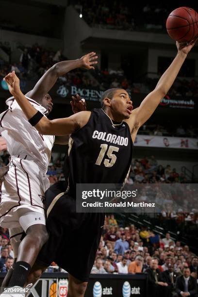 Chris Copeland of the Colorado Buffaloes reaches for a loose ball against the Texas A&M Aggies during the quarterfinals round of the Phillips 66 Big...
