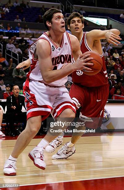 Bret Brieimaier of the Arizona Wildcats moves past Peter Prowitt of the Stanford Cardinal during the quarterfinals of the 2006 Pacific Life Pac-10...